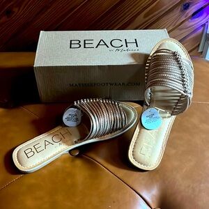 Gold slide sandals, size 8. New with tags, never worn. By Matisse.
